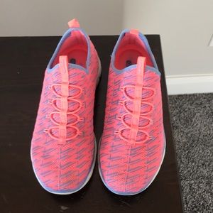 Pink and light blue sketchers memory foam